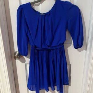 Ruffles dress bright blue in great condition with puffy sleaves